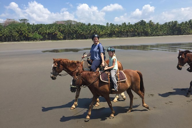 Horseback riding through the beaches of Esterillos near Jaco - The open beach is the main event