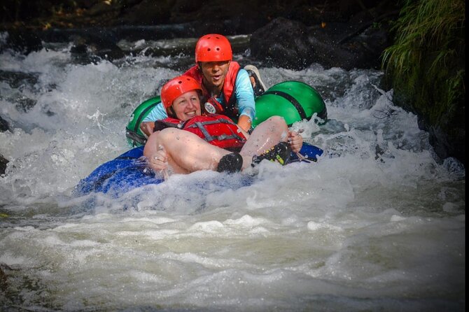 La Leona waterfall Cliffjumping White water Tubbing PrivateTour - Colorado River tubing through the rapids