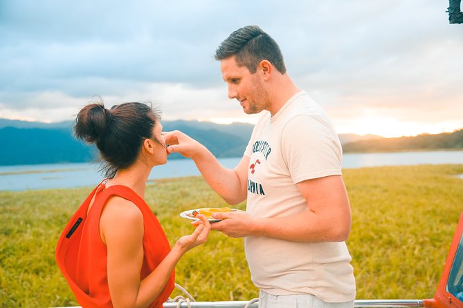 Moonshine Sunset Cruise on Lake Arenal - A relaxed cruise with a local drink in hand