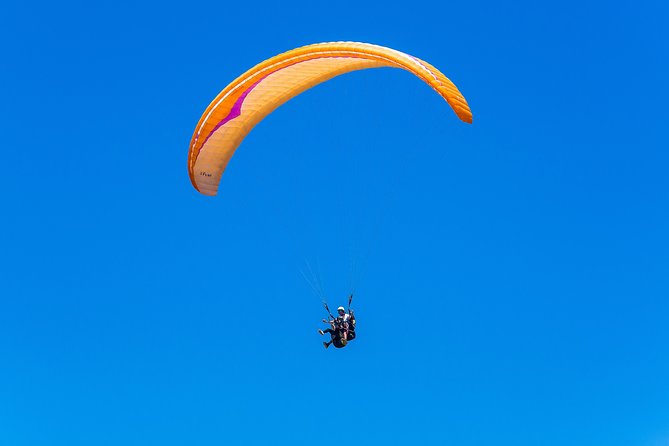 Paragliding tandem flight 1.500 ft & up - Safety, clothing, and group size
