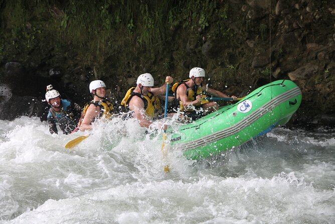 White Water Rafting class V - Waterfalls, a cliff jump, and small pauses in the action